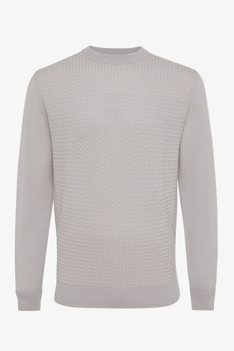 Beige merino trui structuur
